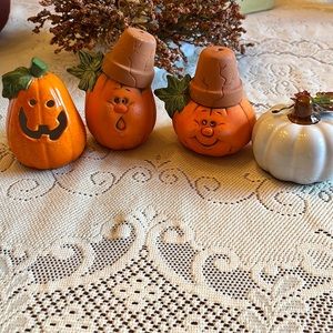 Halloween decorations 4 pumpkins All pottery and one with small chip